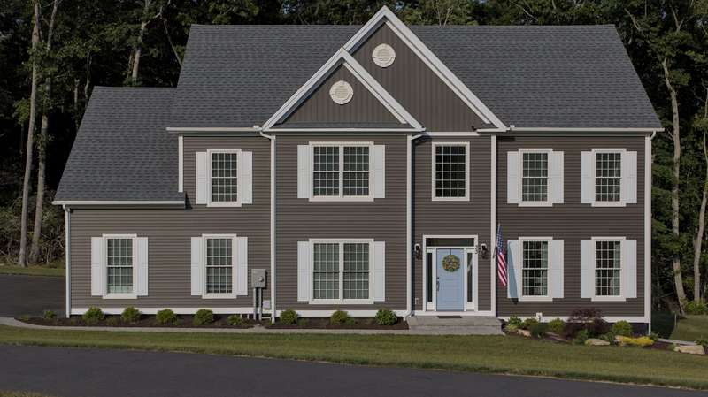 Two-story house with gray vinyl siding and white trim