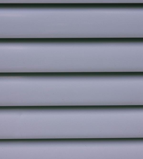 Close view of horizontal vinyl siding panels